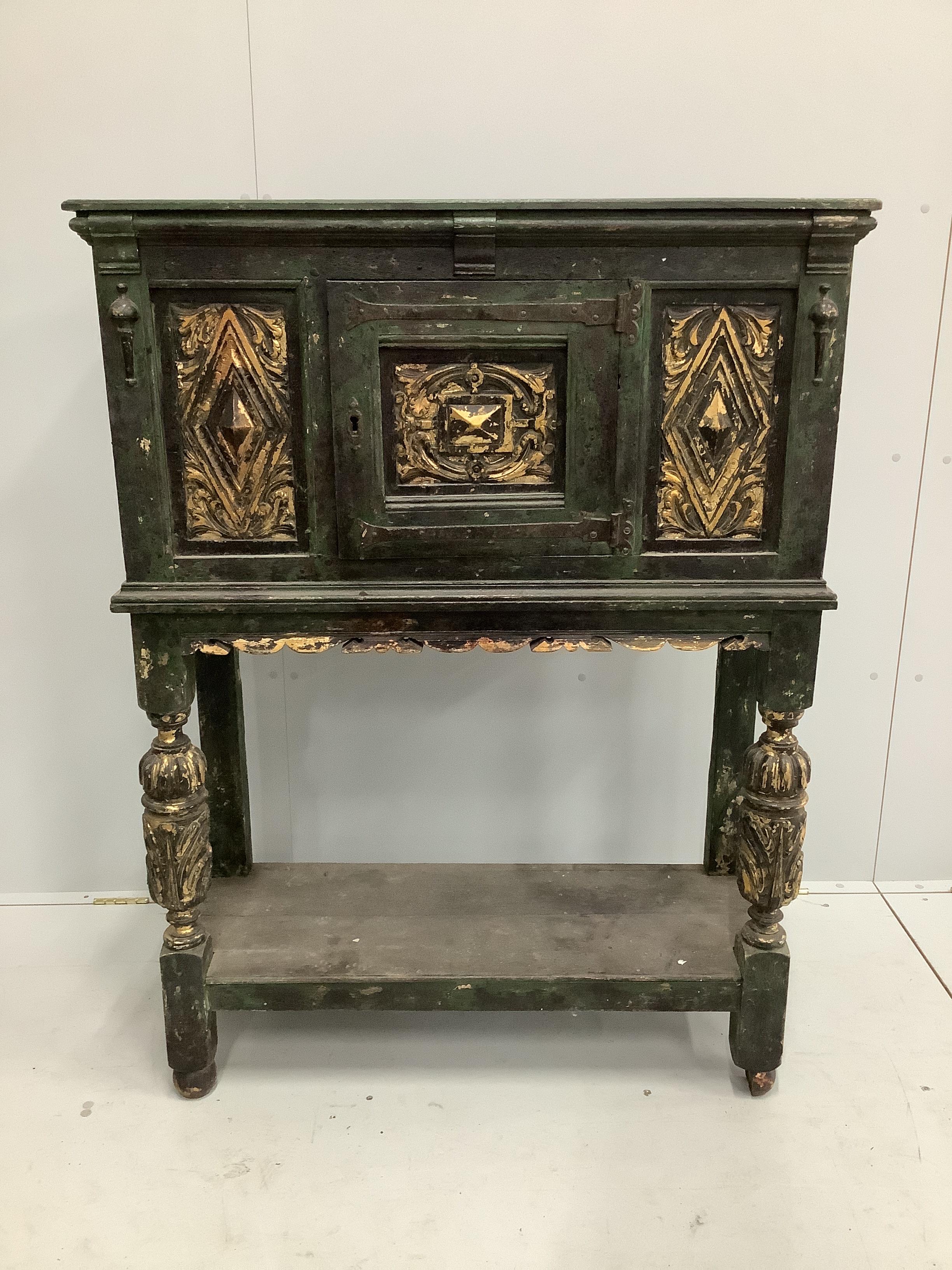 A Jacobean style painted oak cupboard on stand, width 98cm, depth 38cm, height 131cm
